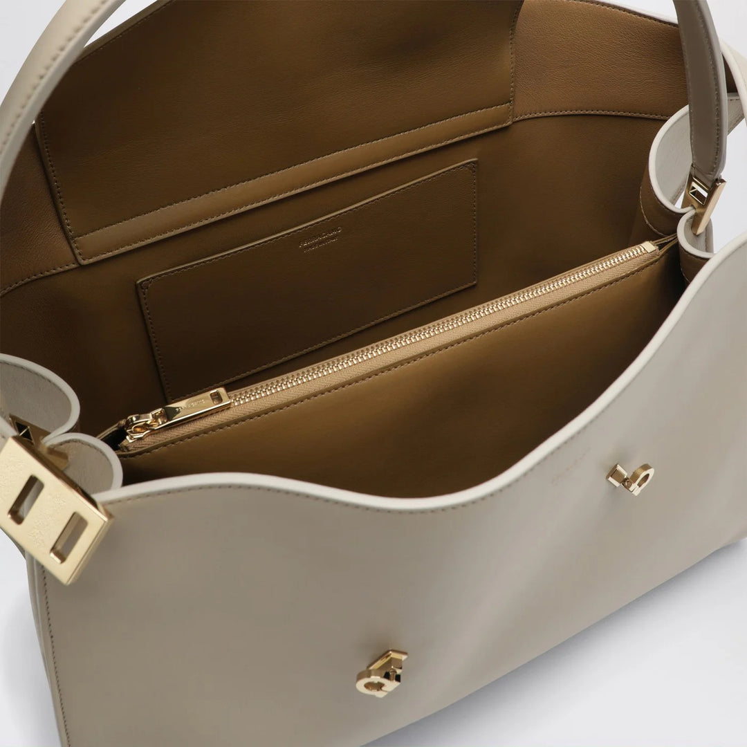 Ferragamo - Ivory and ochre leather Hug Soft L handbag
