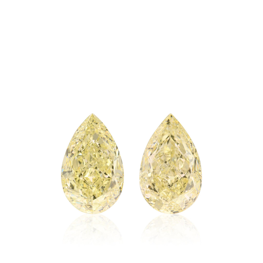 12.06 Carat Light Yellow Pear Diamonds VS1 GIA Pair