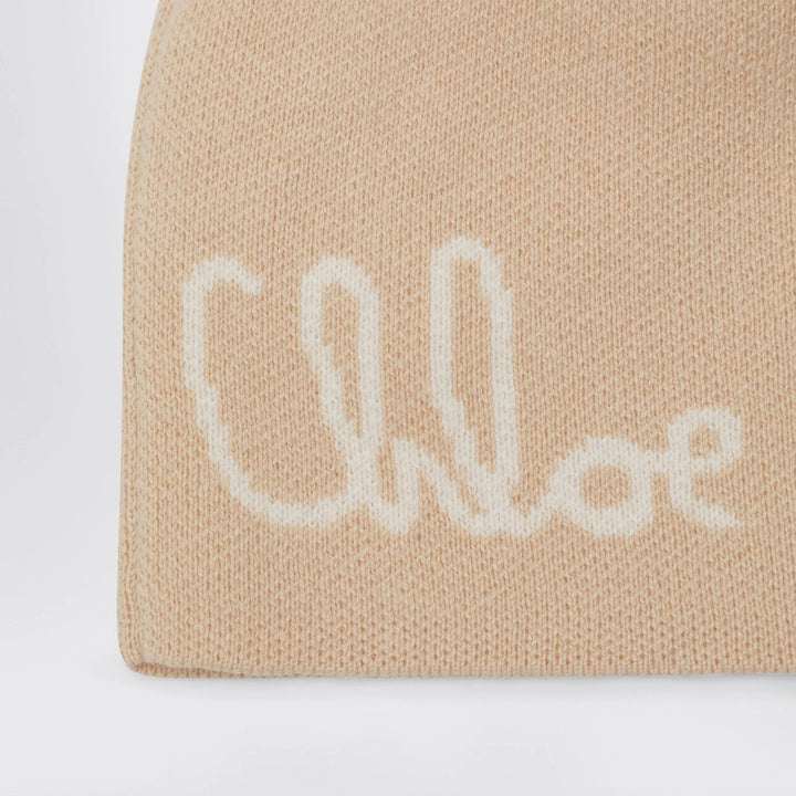 Chloé - Beige pom-pom beanie with logo